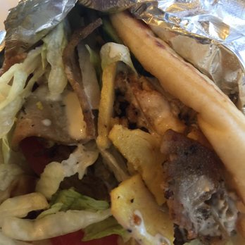 Sam's Cuisine - Mixed shawarma - loads of chicken and beef with tasty accompaniments. No skimping here. - Mediterranean Near Me - Davis, California Sam's Cuisine - Mixed shawarma - loads of chicken and beef with tasty accompaniments. No skimping here. - Mediterranean Near Me - Davis, California