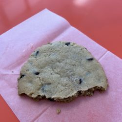 Eileen's Colossal Cookies - partially eaten chocolate chip cookie