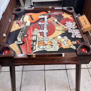 Eve La Cubanita - Dominoes table - love it. Brings back memories - Coffee & Tea Near Me - St. Cloud, Florida