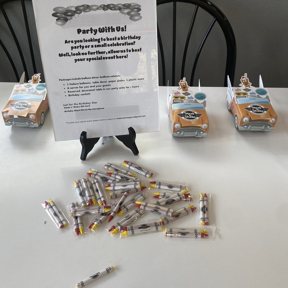 Steak ’n Shake - a table with a variety of items - American Near Me - Sunrise, Florida Steak ’n Shake - a table with a variety of items - American Near Me - Sunrise, Florida