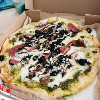 Smack Pie Pizza - Regular crust with pesto, mushrooms, olives and salami and a drizzle of ranch on top - Pizza Near Me - Lodi, California