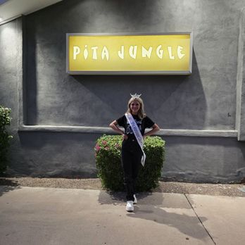 Pita Jungle - Me in front of the Pita Jungle sign. - Mediterranean Near Me - Mesa, Arizona
