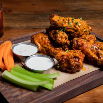 Finney's Crafthouse - Camarillo - a platter of buffalo wings, carrots, celery, celer - New American Near Me - Camarillo, California