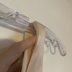 Mariolka's Bridal Boutique - Terrible sewing on straps. Thread showing, fabric not laying correctly.