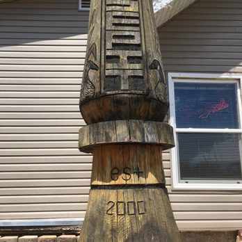 Goose Pit - a wooden clock tower in front of a house - Bars Near Me - Banner, Illinois Goose Pit - a wooden clock tower in front of a house - Bars Near Me - Banner, Illinois