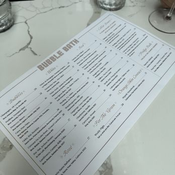 Bubble Bath - a menu on a marble table - Wine Bars Near Me - Boston, Massachusetts
