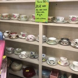 I do love tea cups! And look at that sale sign!