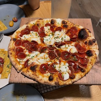 Avec River North - Pepperoni pizza. Thin crust with loaded toppings and cheese. Very satisfying... - Mediterranean Near Me - Chicago, Illinois