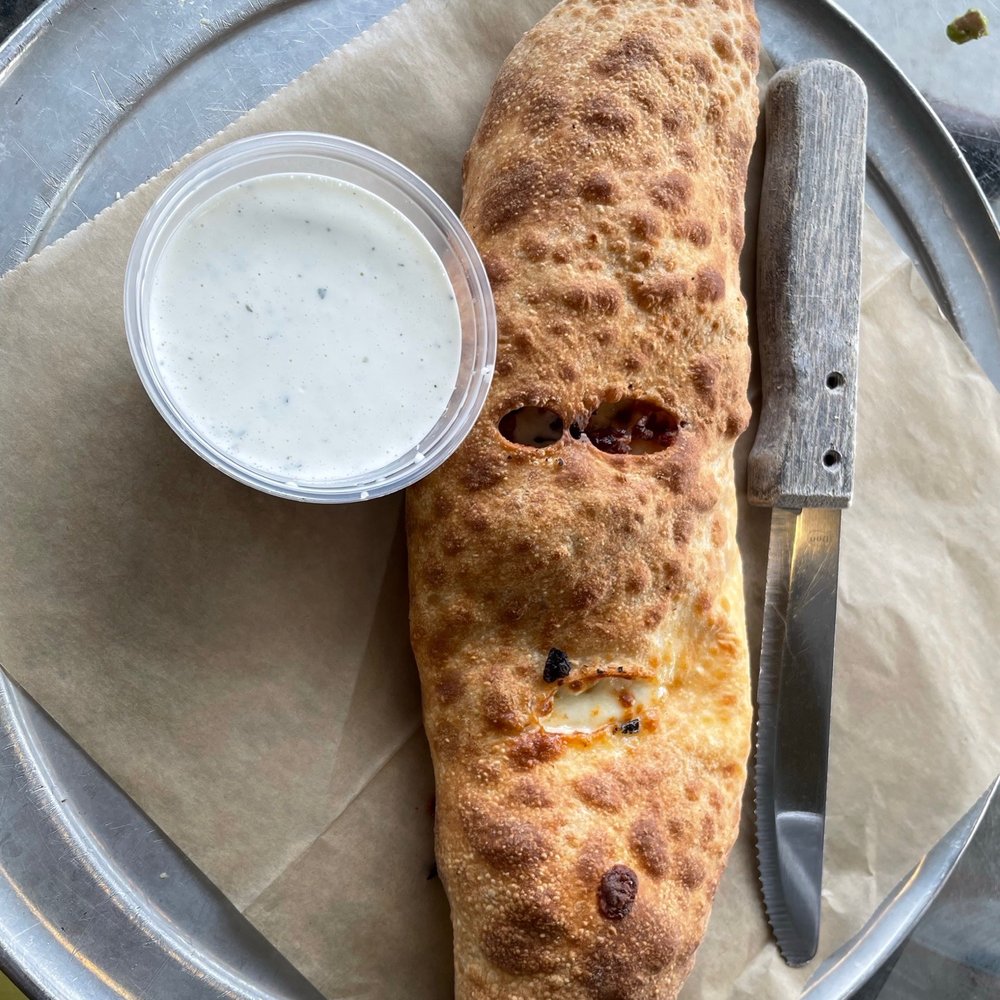 The Filling Station - Chicken Bacon Cheddar Stromboli - Pizza Near Me - Birmingham, Alabama The Filling Station - Chicken Bacon Cheddar Stromboli - Pizza Near Me - Birmingham, Alabama