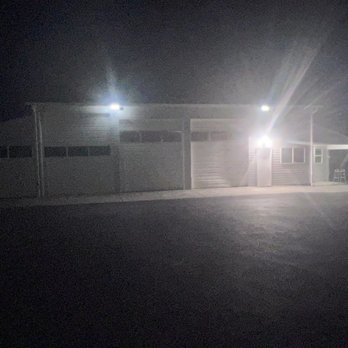 Ridgetop Electric - Shop with new lights at night. - Electricians Near Me - Battle Ground, Washington
