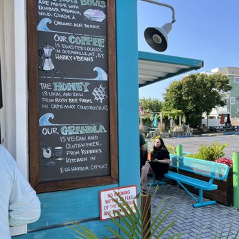 Soulberri - a man standing outside of a restaurant - Juice Bars & Smoothies Near Me - Brigantine, New Jersey