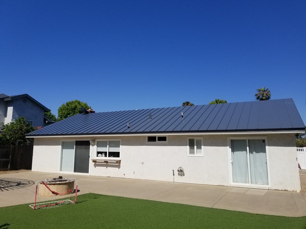 Slide of Dana Logsdon Roofing & Solar