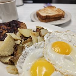Kozy Corners - The A.M. Special: eggs (sunny side up), meat (sausage patties), potatoes (home fries), toast (wheat), and coffee. Filling and delicious!