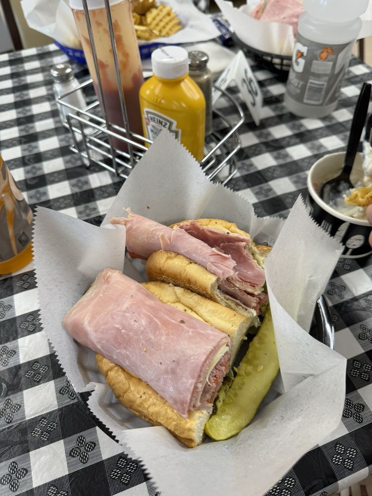 The Hoagie Man Deli Logo