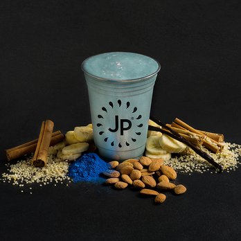 Juice Press - a cup of blue powder, bananas, almonds, and cinnamons - Juice Bars & Smoothies Near Me - New York, New York Juice Press - a cup of blue powder, bananas, almonds, and cinnamons - Juice Bars & Smoothies Near Me - New York, New York