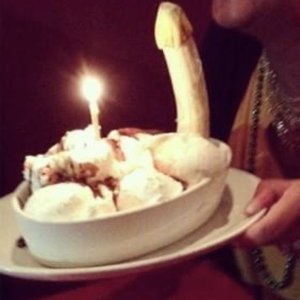 Photo of NOLA Restaurant & Bar - Palo Alto, CA, United States. Banana split with a end piece of its peel still on the banana