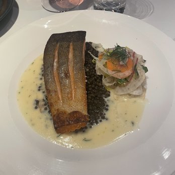 Gordon Ramsay Hell's Kitchen - Crispy skin salmon with a bed of lentils and a small salad - Steakhouses Near Me - Stateline, Nevada