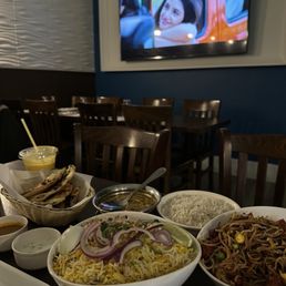 Chicken Mughalai, goat Biryani, Mango Lassi, Hakka Noodles, Chilli Garlic Fish, 2 Pieces Samosa Chicken Mughalai, goat Biryani, Mango Lassi, Hakka Noodles, Chilli Garlic Fish, 2 Pieces Samosa