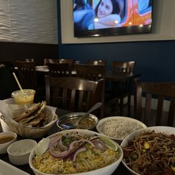Bawarchi Biryanis - Chicken Mughalai, goat Biryani, Mango Lassi, Hakka Noodles, Chilli Garlic Fish, 2 Pieces Samosa