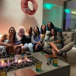 Group rooftop dinner after a day of personal transformation & heart based business building.