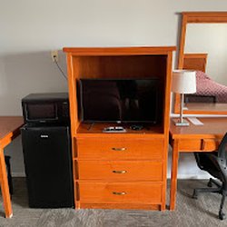 Sundowner Motel - Entertainment Center in every room