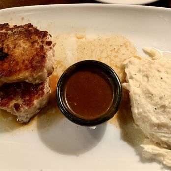 LongHorn Steakhouse - Cowboy Pork Chops with mashed potatoes and brown gravy on the side - Steakhouses Near Me - Covington, Georgia LongHorn Steakhouse - Cowboy Pork Chops with mashed potatoes and brown gravy on the side - Steakhouses Near Me - Covington, Georgia