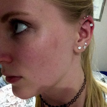 Sesentainueve - Triple forward helix. - Tattoo Near Me - Seville, SE