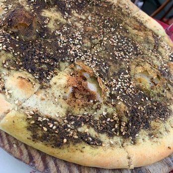 Uncle Momo - Zaatar pie - Lebanese Near Me - Jersey City, New Jersey Uncle Momo - Zaatar pie - Lebanese Near Me - Jersey City, New Jersey