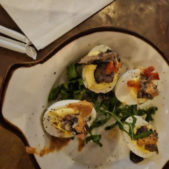 Prohibition Kitchen - Deviled eggs with stripes of steak over top - Bars Near Me - St. Augustine, Florida Prohibition Kitchen - Deviled eggs with stripes of steak over top - Bars Near Me - St. Augustine, Florida