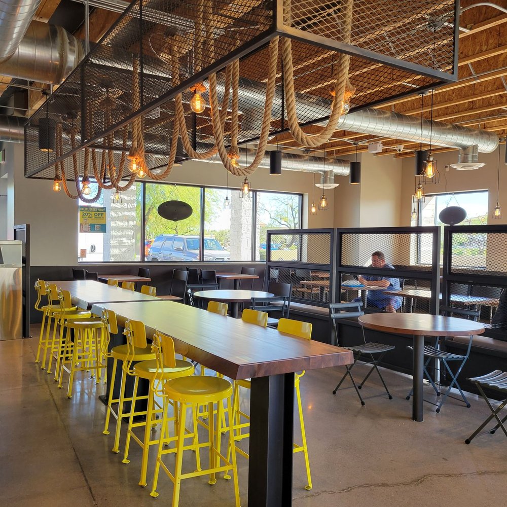 Interior. So cute! I love the yellow stools. Interior. So cute! I love the yellow stools.