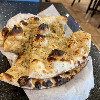 Aroma Indian Cuisine - Rosemary garlic naan - Indian Near Me - Bloomington, Minnesota Aroma Indian Cuisine - Rosemary garlic naan - Indian Near Me - Bloomington, Minnesota