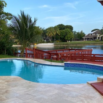 Ross Services - Beautiful new travertine deck from Ross Services. - Pool & Hot Tub Service Near Me - Coral Springs, Florida