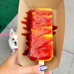Mango paleta with watermelon & mango chamoy with Tajin sprinkle. Pup not included