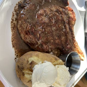 Susie and Sam’s Steakhouse - Bone in porterhouse steak with baked potato - Steakhouses Near Me - Bainbridge, Georgia Susie and Sam’s Steakhouse - Bone in porterhouse steak with baked potato - Steakhouses Near Me - Bainbridge, Georgia