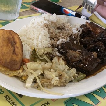 Kingston 30 - Oxtails, white rice, fried plantain and cabbage - Caribbean Near Me - Lawrenceville, Georgia
