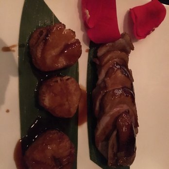 Grace's Mandarin - Scallop Duck with plum sauce over green leaves and rose petals. - Asian Fusion Near Me - Oxon Hill, Maryland Grace's Mandarin - Scallop Duck with plum sauce over green leaves and rose petals. - Asian Fusion Near Me - Oxon Hill, Maryland