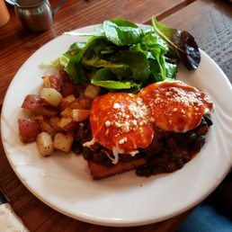 Huevos rancheros: Cornbread, beans, Ranchero sauce, potatoes, greens. Notably lacking the avocado / guac mentioned on the menu. Just ok. Huevos rancheros: Cornbread, beans, Ranchero sauce, potatoes, greens. Notably lacking the avocado / guac mentioned on the menu. Just ok.