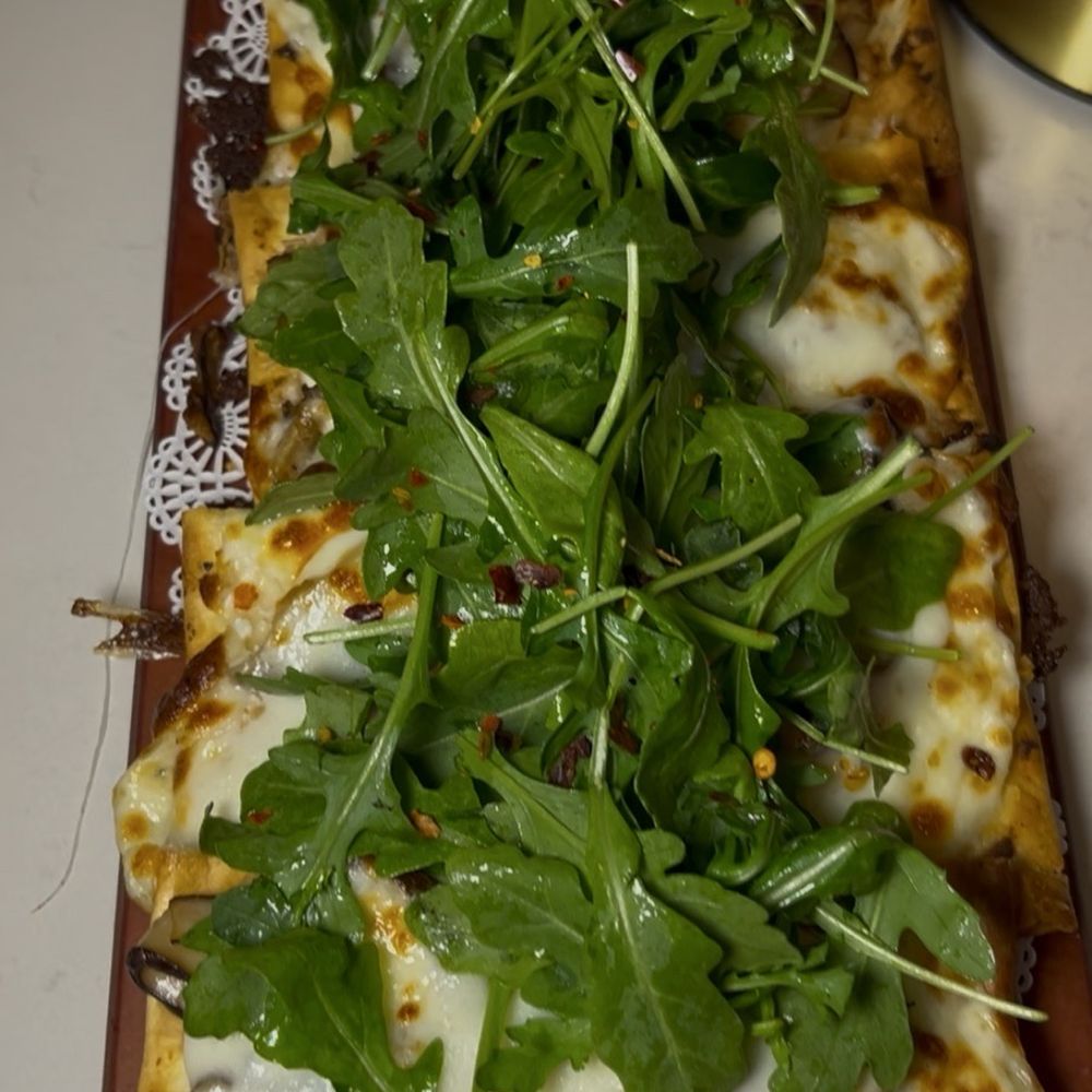 Wild mushroom and arugula flatbread Wild mushroom and arugula flatbread