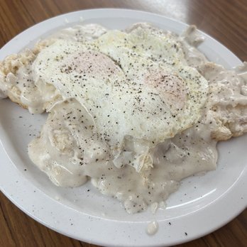 Dottie's Cafe - Biscuits and gravy with two eggs over easy. - American Near Me - Dubuque, Iowa