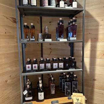 Hollerhorn Distilling - a shelf of liquor - Distilleries Near Me - Naples, New York