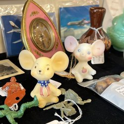 Nest 1896 - Hand-painted Fenton Mice in our display case.