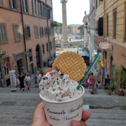 Il Cannolo Siciliano - Steps right outside the place to sit and eat, all while enjoying a decent view. Lots of traffic behind, nonstop.