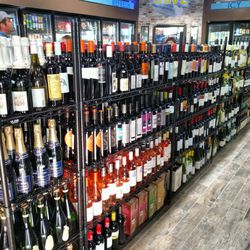 Woody's Country Market - Wine selection is inexpensive. And Vast.