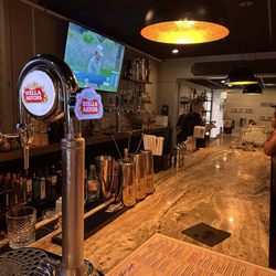 West Village Tavern - The bar area to the right of us