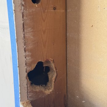 Leal Electric - Butchered wall stud next to new panel location. - Electricians Near Me