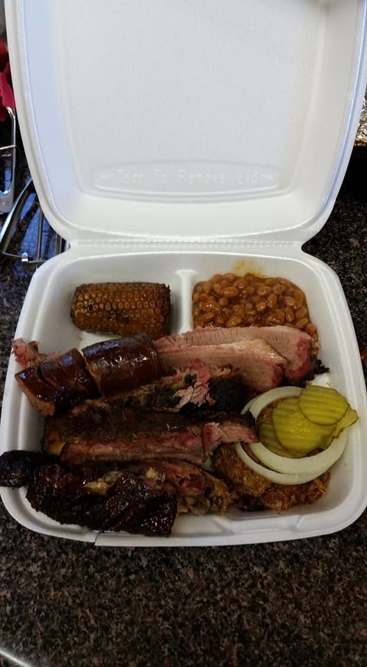 Rolling Smoke's BBQ & Catering Logo