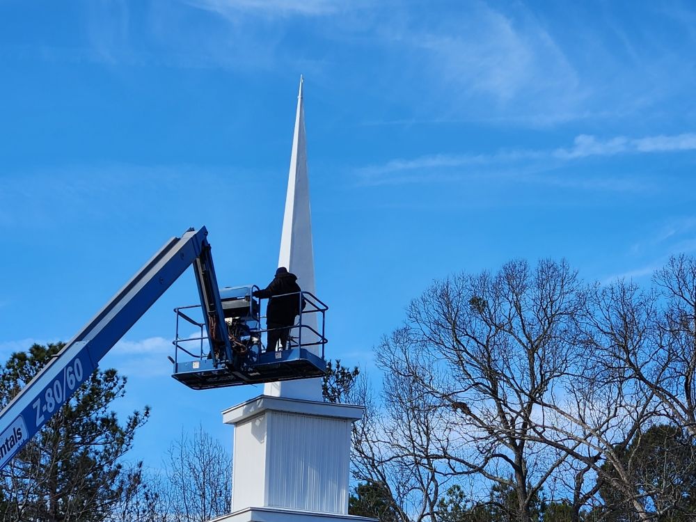 Slide of E. Thompson Roofing