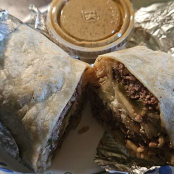 Moe's Southwest Grill - Brisket burrito with Moe's sauce - Tex-Mex Near Me - Davie, Florida Moe's Southwest Grill - Brisket burrito with Moe's sauce - Tex-Mex Near Me - Davie, Florida