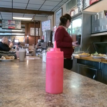 Wein-O-Rama - ows a woman preparing food in a restaurant - Hot Dogs Near Me - Cranston, Rhode Island Wein-O-Rama - ows a woman preparing food in a restaurant - Hot Dogs Near Me - Cranston, Rhode Island