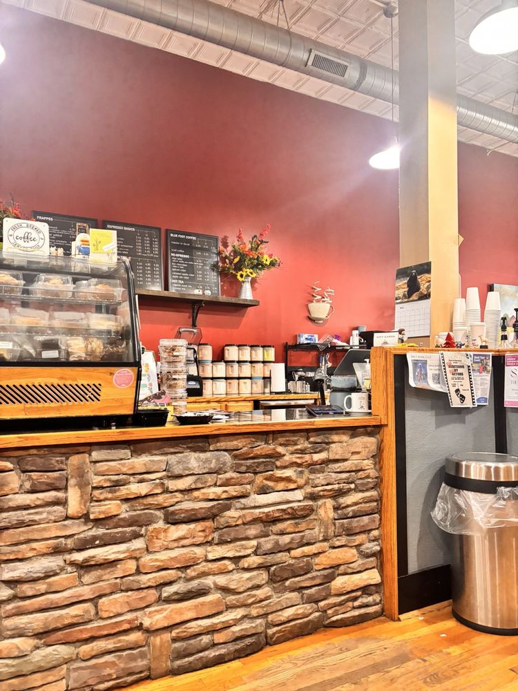 Pages Books & Coffee Logo